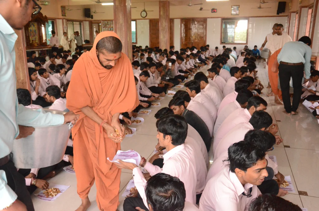 Swamishree GivingDryfruits (1)